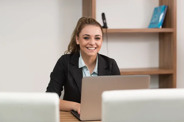 Happy Student At Library Using Her Laptop — Stock Photo, Image