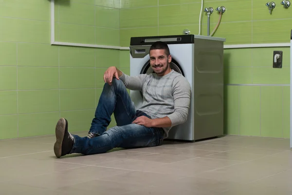 Young Man Doing Housework Laundry — Stock Photo, Image