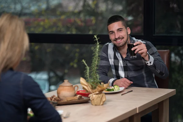 Couple Enjoying Meal In Restaurant — Stock Photo, Image