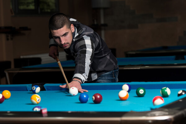 Smiling Happy Man Playing Billiard