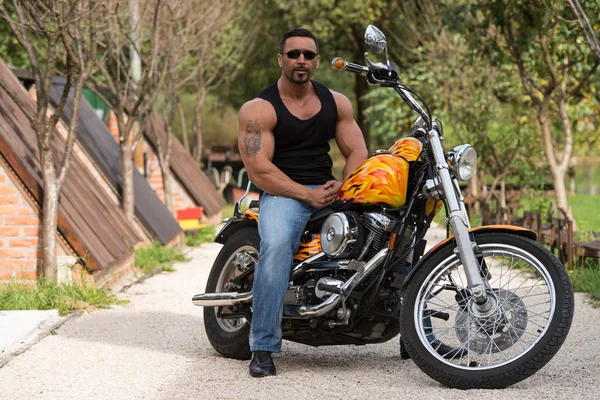 Muscular Man And Motorcycle Stock Photo - Image of journey 