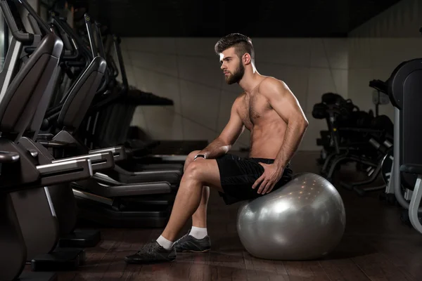 Handsome Man With An Exercise Ball — Stock Photo, Image