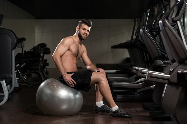 Handsome Man With An Exercise Ball — Stock Photo, Image