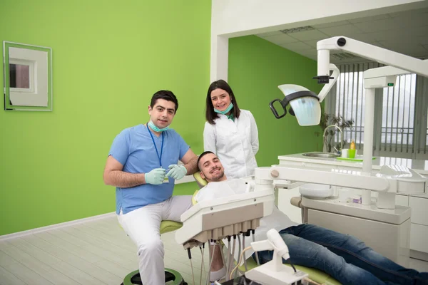 Portrait Of A Dentist , Assistant And Patient — Stock Photo, Image