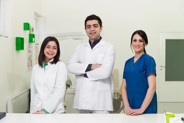 Portrait Of A Young Dentist And His Assistant — Stock Photo, Image