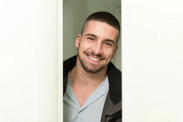 Young Man Entering Through His Front Door — Stock Photo, Image