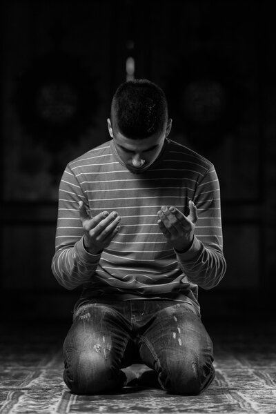 Young Muslim Man Praying