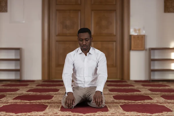 Young African Guy Praying In Mosque — Stock Photo, Image