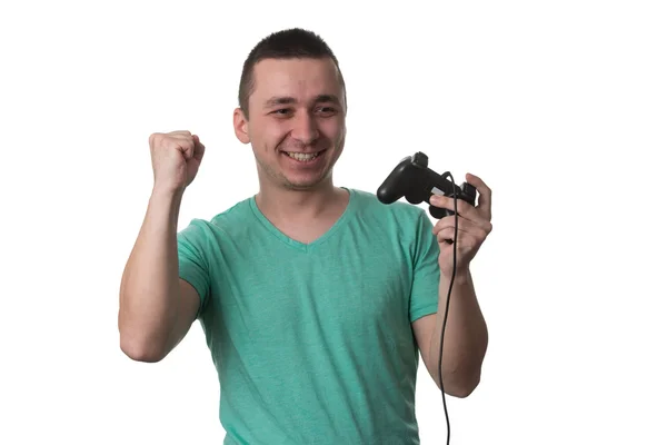 白い背景の上のビデオゲームをプレイ男を集中 — ストック写真