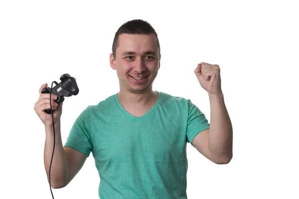 남자는 흰색 바탕에 비디오 게임을 집중 — 스톡 사진