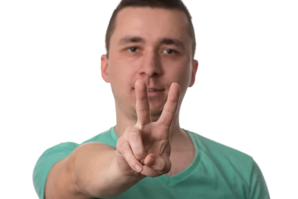 Man ger Peace Sign - vit bakgrund — Stockfoto