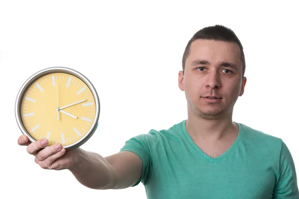 Man Holding A Clock Over White Background — Stock Photo, Image