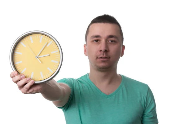 Man Holding A Clock Over White Background — Stock Photo, Image