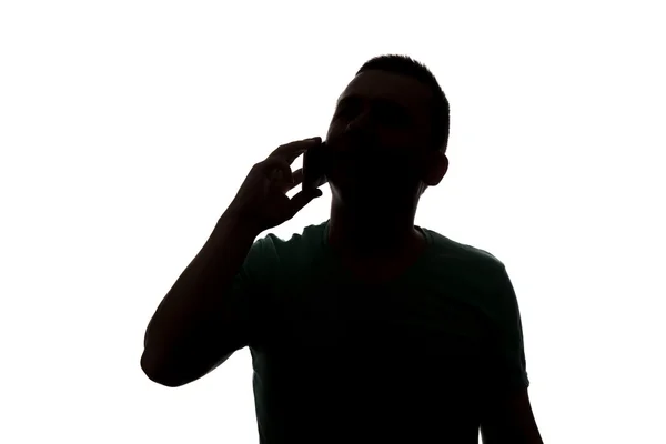 Silhouette Man Calling On Phone On White Background — Stok Foto