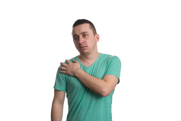 Jeune homme avec douleur à l'épaule - fond blanc — Photo