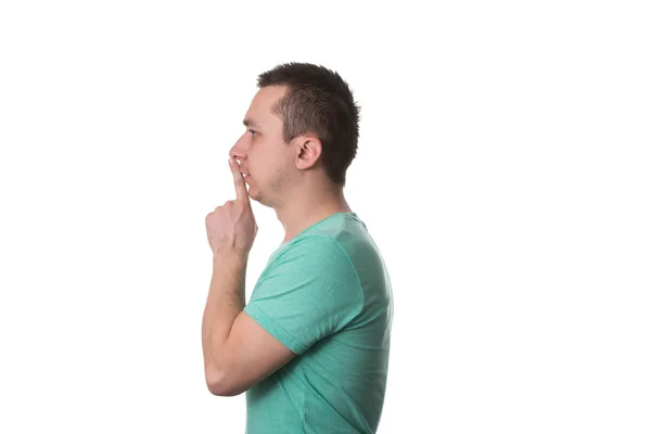 Homem mostrando gestos de shh no fundo branco — Fotografia de Stock