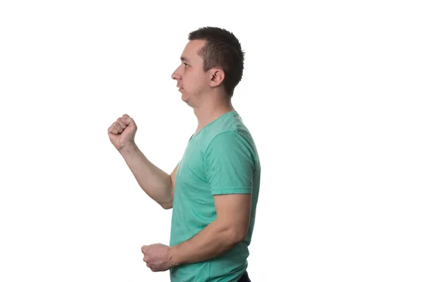 Portrait Of Angry Young Man Clenching His Fist — Stock Photo, Image