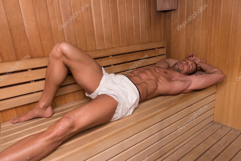 Portrait Of A Muscular Man Relaxing In Sauna Stock Photo by ©ibrak 72901907