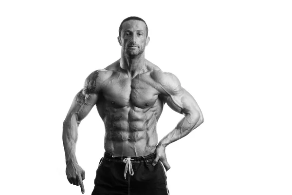 Muscular halterofilista cara posando sobre fundo branco — Fotografia de Stock