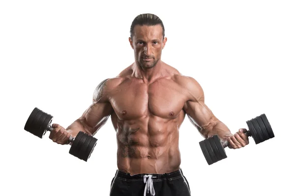 Hombre haciendo ejercicio con sombrillas sobre fondo blanco —  Fotos de Stock