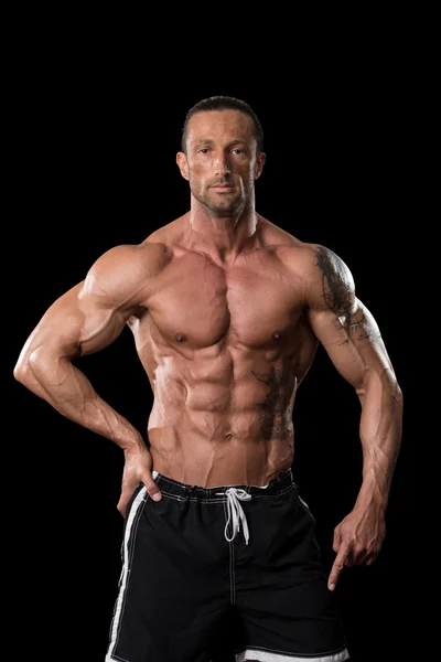 Muscular Bodybuilder Guy Posing Over Black Background — Stock Photo, Image