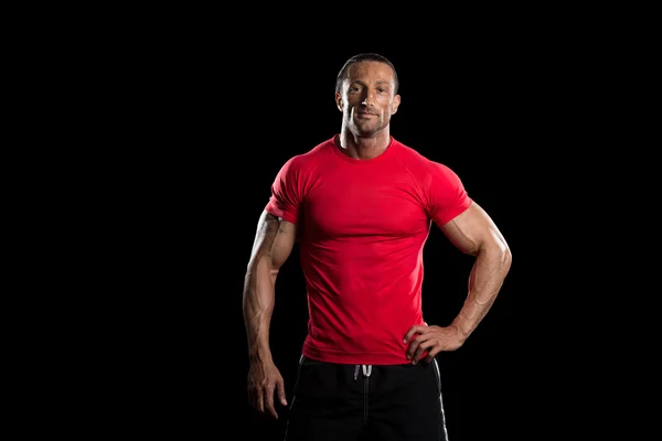 Muscular Bodybuilder Man Posing Over Black Background — Stock Photo, Image