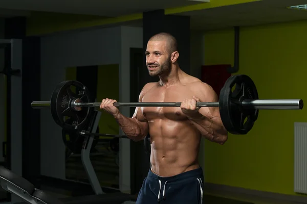 Young Man Doing Exercise For Biceps — Stock Photo, Image