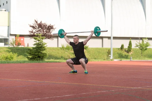 Young Man Doing A Overhead Squat Exercise Outdoor — 图库照片