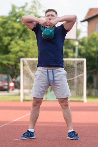 Exercise With Kettle Bell Outdoor — 图库照片