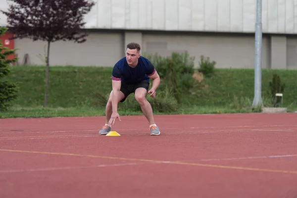 Athlete Running To The Cone — Stock fotografie