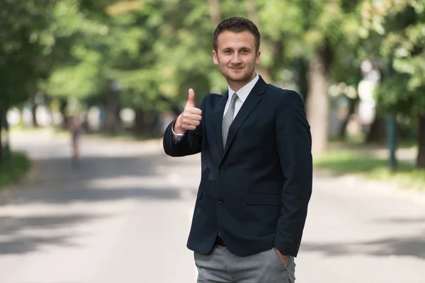 Gelukkig zakenman duimen omhoog teken weergegeven: — Stockfoto