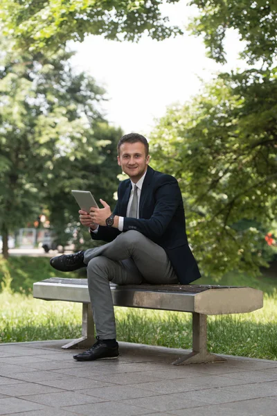 Young Man Working On Tablet Outside The Office — Stock Photo, Image