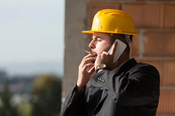 Businessman Talking On Phone And Smoking A Cigar — Stock Photo, Image