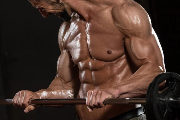 Bodybuilder Exercising Biceps With Barbell — Stock Photo, Image