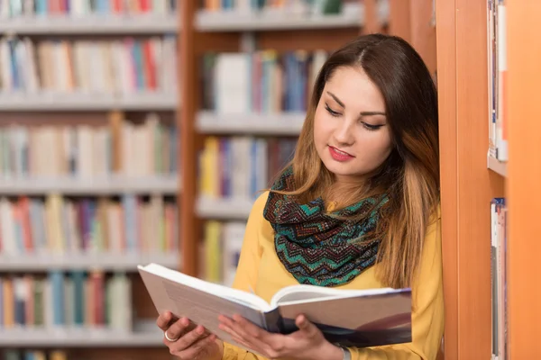 Female College Student In A Library Stock Photo