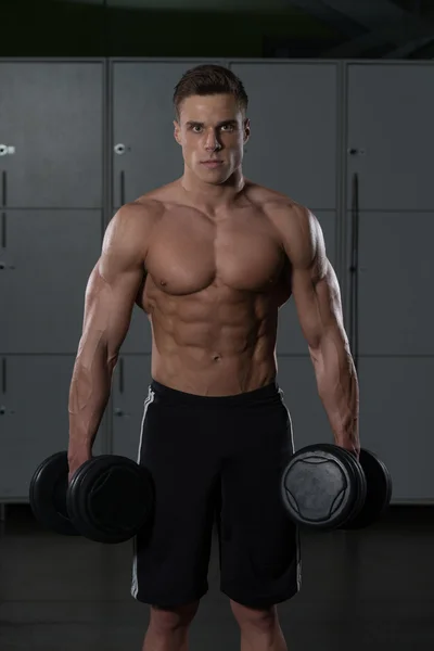 Healthy Young Man Doing Exercise For Biceps — Stock Photo, Image