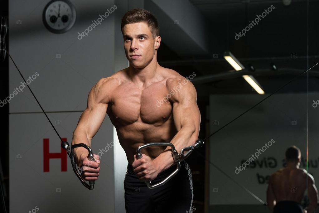 Chest Workout With Cables Stock Photo by ©ibrak 90210784