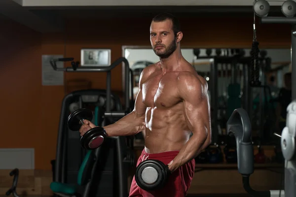 Healthy Young Man Doing Exercise For Biceps — Stock Photo, Image