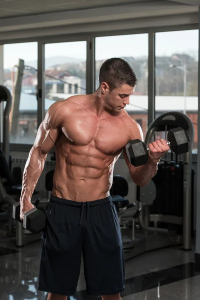 Healthy Young Man Doing Exercise For Biceps — Stock Photo, Image