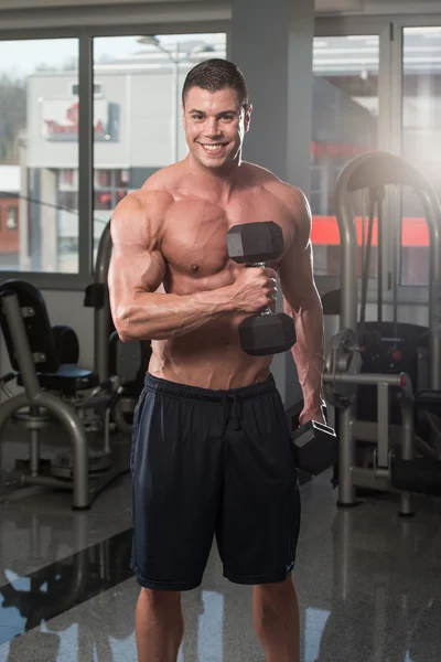 Healthy Young Man Doing Exercise For Biceps — Stock Photo, Image