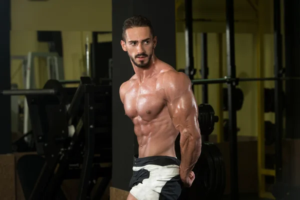 Muscular Man Flexing Muscles — Stock Photo, Image