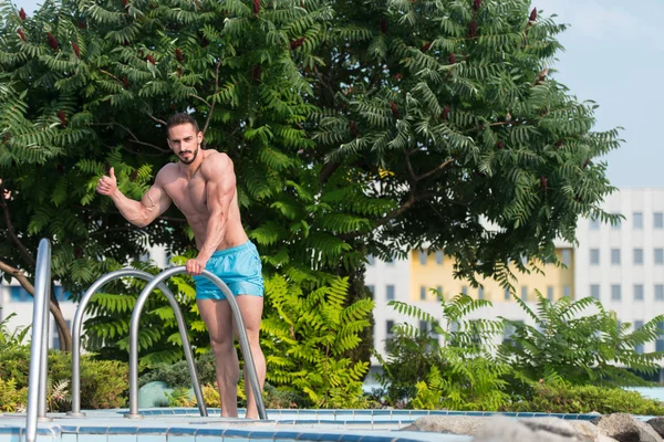 Showing Thumbs Up Sign At Swimming Pool — Stock Photo, Image