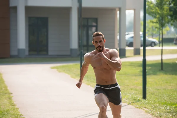 Bodybuilder Fitness Trening joggingowy Wellness Concept — Zdjęcie stockowe