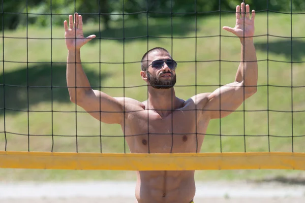 Volleyball Player Pushing Ball Over Net — Stock Photo, Image