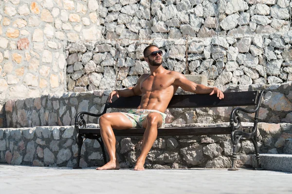 Handsome Guy Resting On Bench Outdoors — Stock Photo, Image