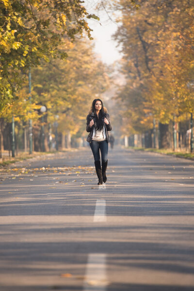 Attractive Woman Walking In The Woods