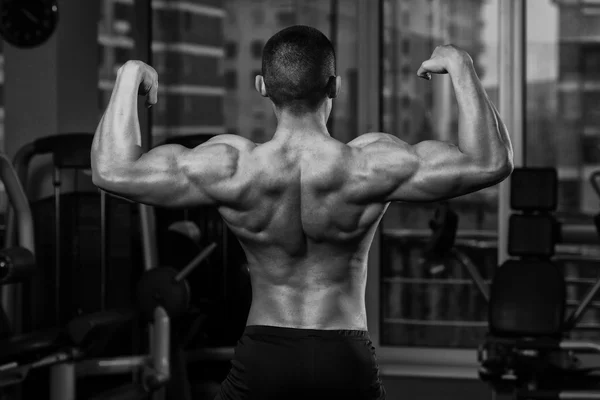 Pose double biceps — Photo