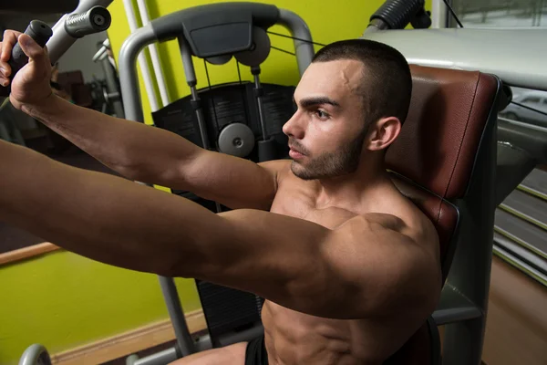 Young Muscular Sports Man Doing Butterfly Exercise — Stock Photo, Image