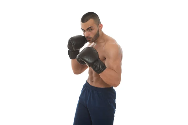 Человек в боксёрских перчатках изолирован на белом фоне — стоковое фото