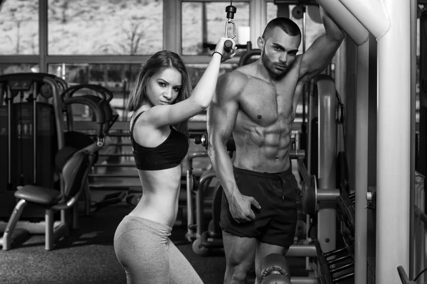 Young Couple Doing Heavy Weight Exercise For Triceps — Stock Photo, Image
